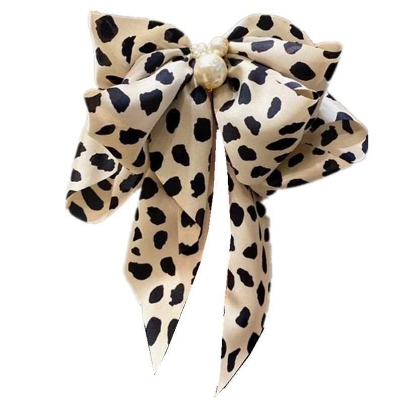 Oversized pearl satin bow
